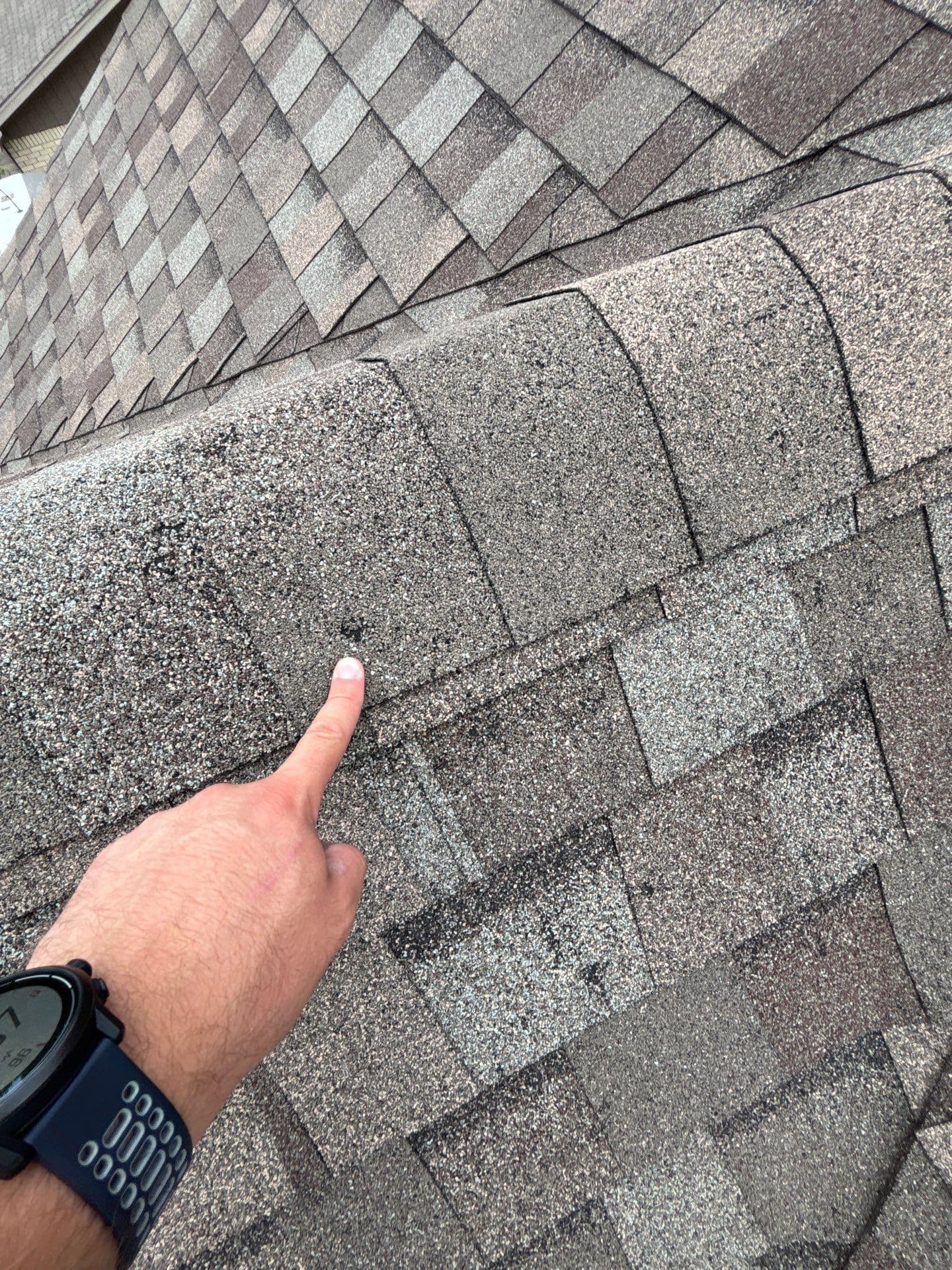 Pattern of hail damage across multiple shingles